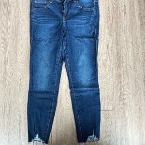 Stretch Skinny Jeans with Frayed Bottoms - Torrid